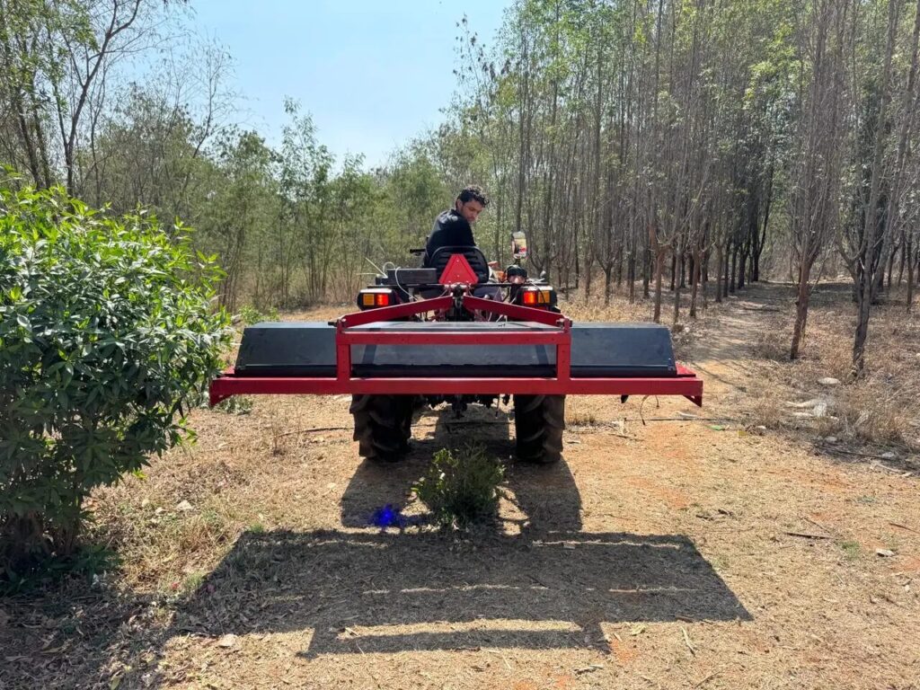 AI-powered laser-based weeding robot of Harvested Robotics mounted on a tractor